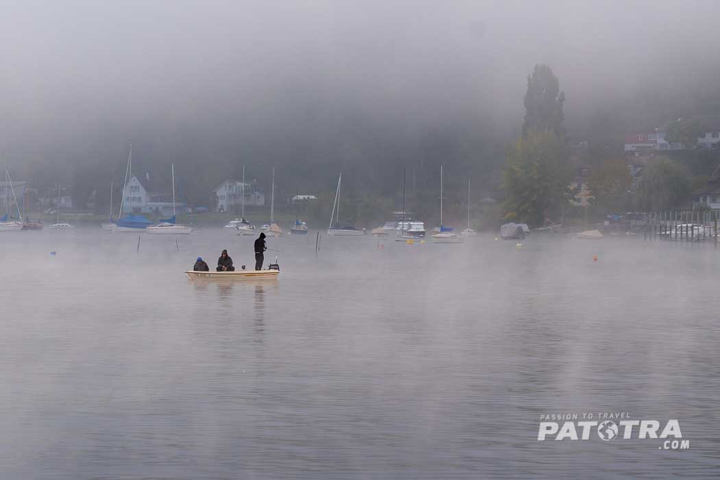 Fischer im Nebel am Bodensee